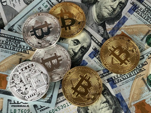 Bitcoin coins on cash representing wallet and network verification before sending funds